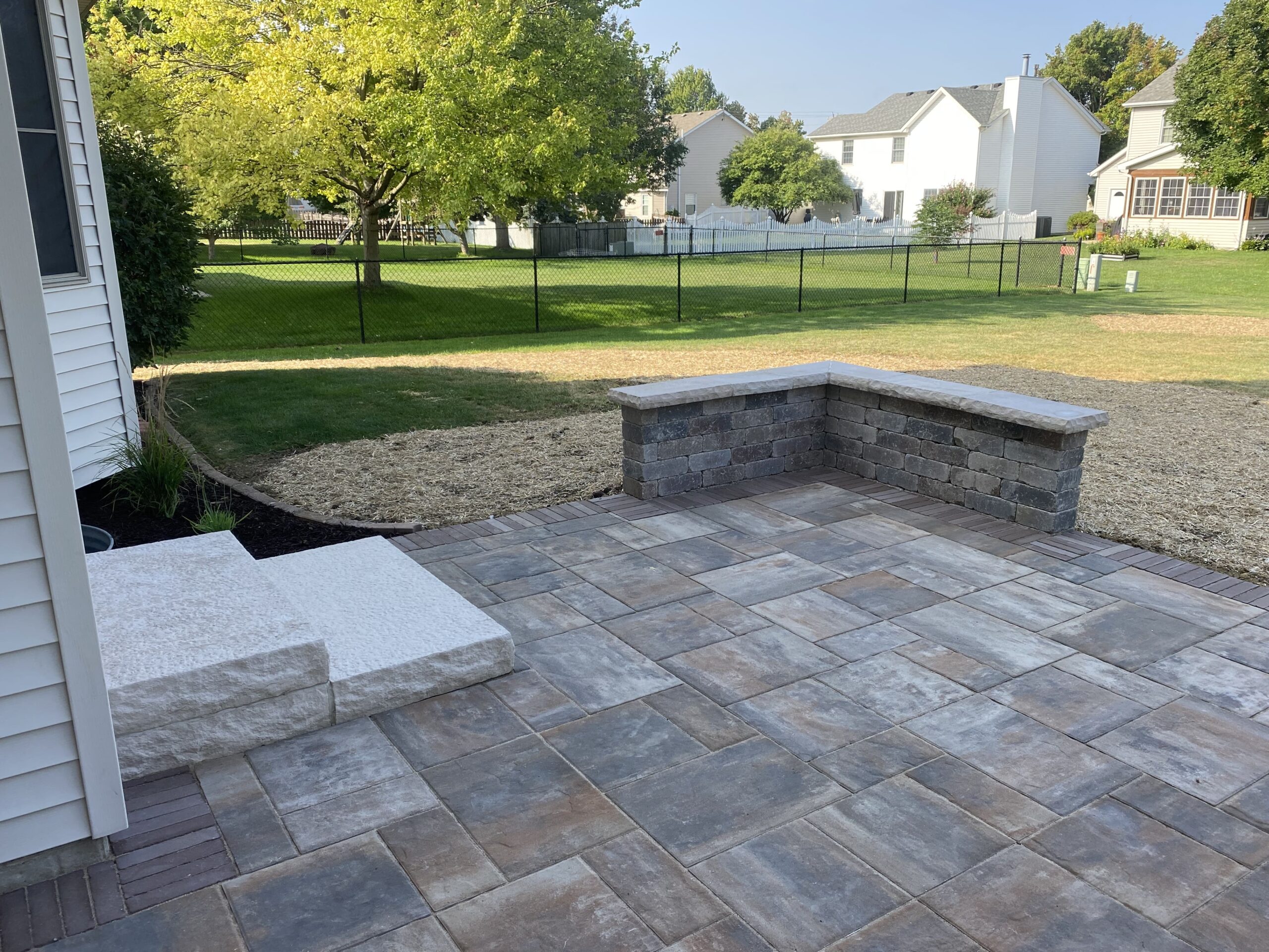 Krueger Lawn and Landscaping's Paver Patio: Your Pathway to Serenity