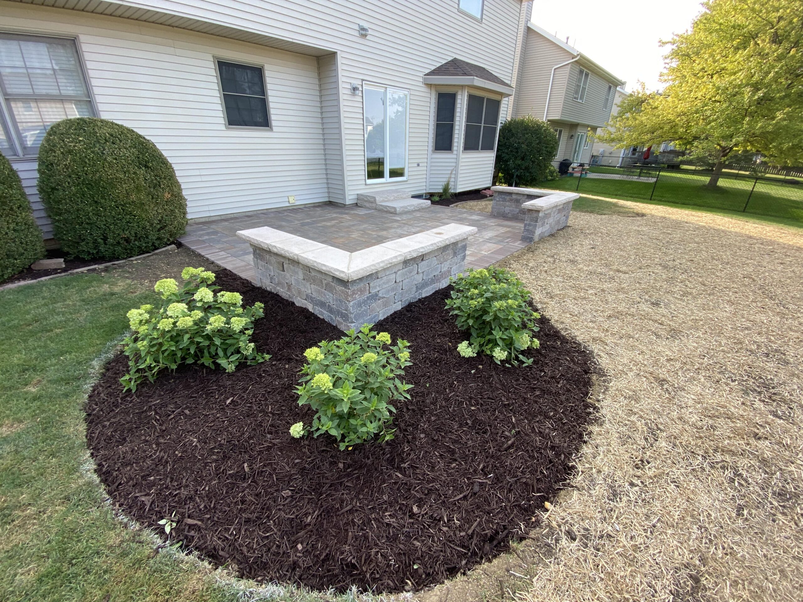 Experience Luxury Living Outdoors: Krueger Lawn and Landscaping's Paver Patio