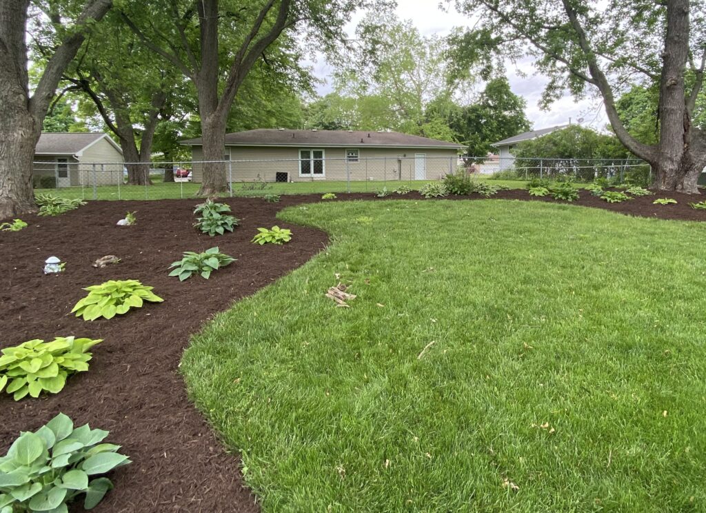 Experience the beauty and functionality of mulch landscaping with Krueger Lawn and Landscaping.