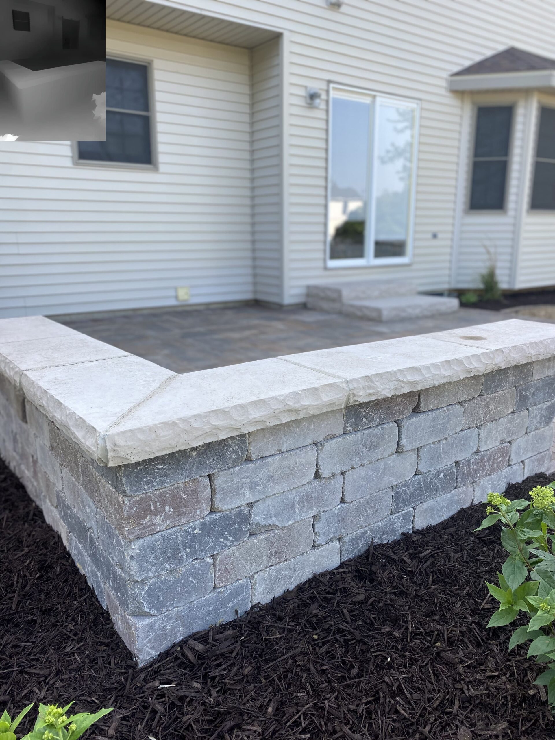 Revitalize Your Outdoor Space with Krueger Lawn and Landscaping's Paver Patio Renovation