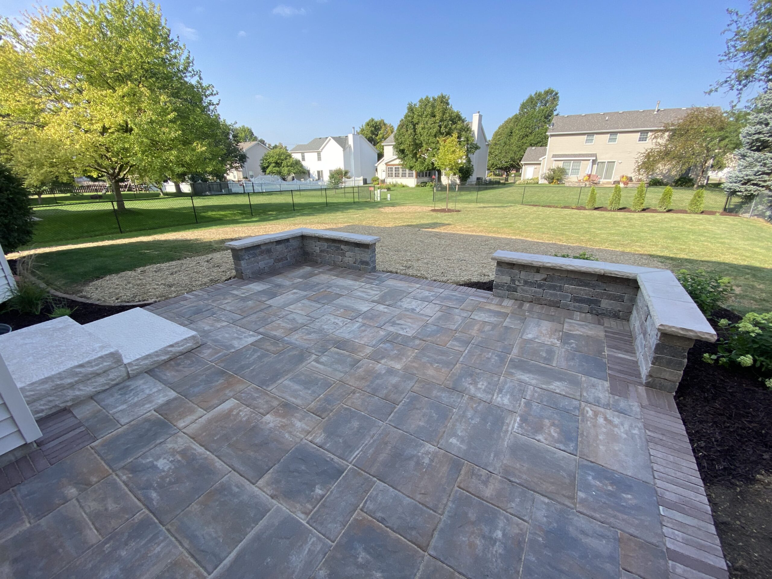 Step into Paradise with Krueger Lawn and Landscaping's Paver Patio Design