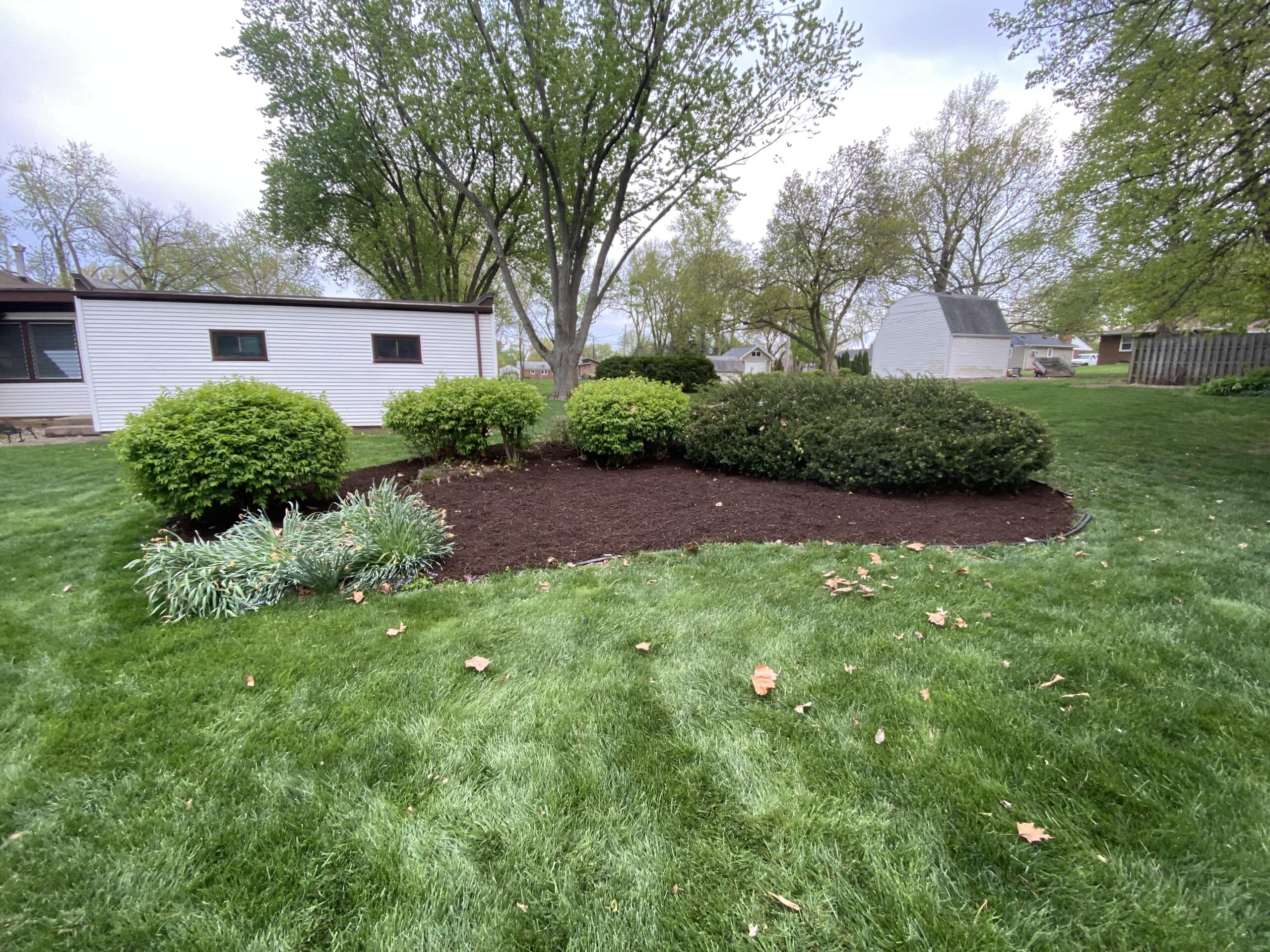 Krueger Lawn and Landscaping specializes in custom mulch landscaping solutions