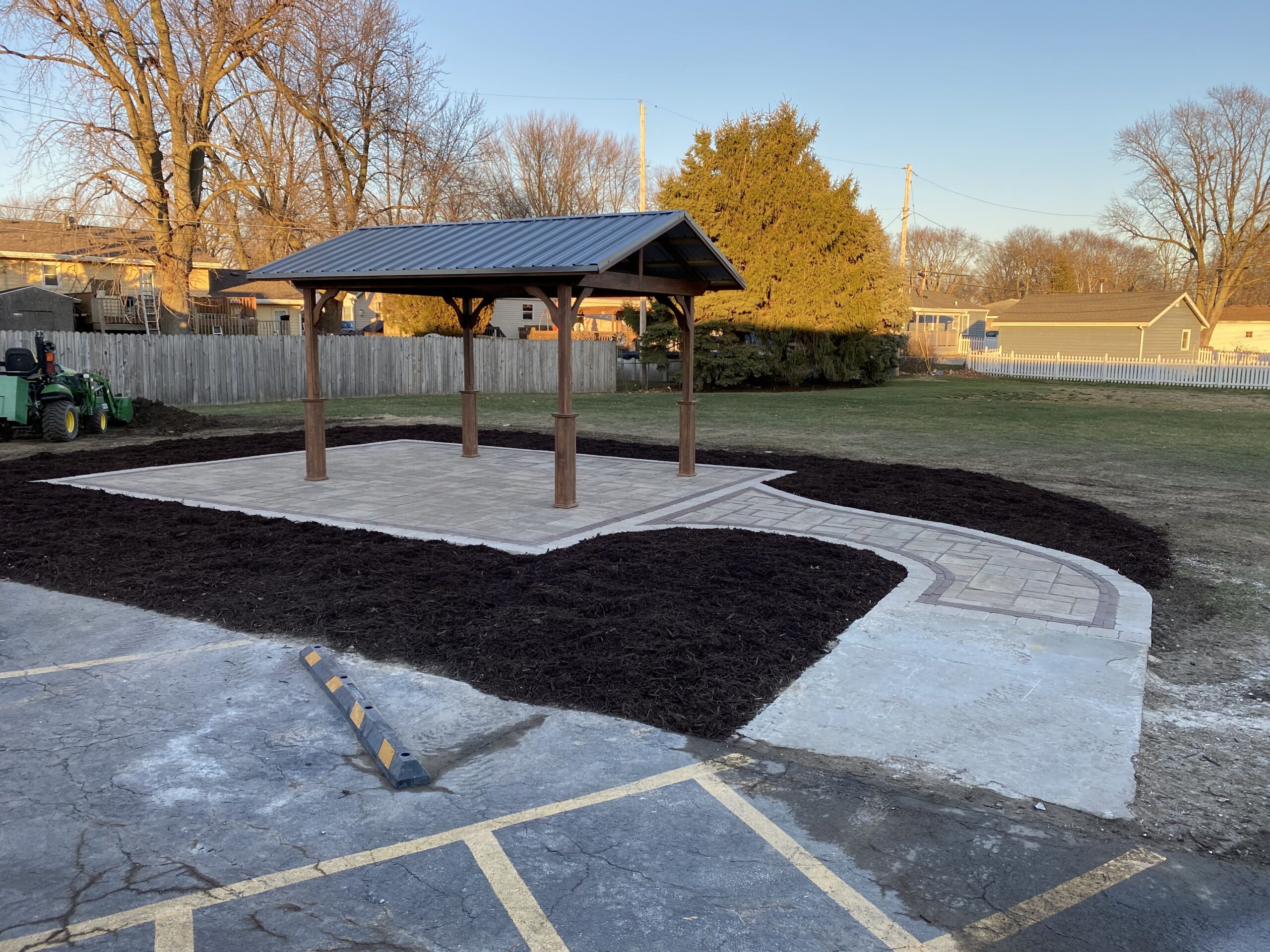 Enjoy outdoor dining on Krueger Lawn and Landscaping's stone patio.