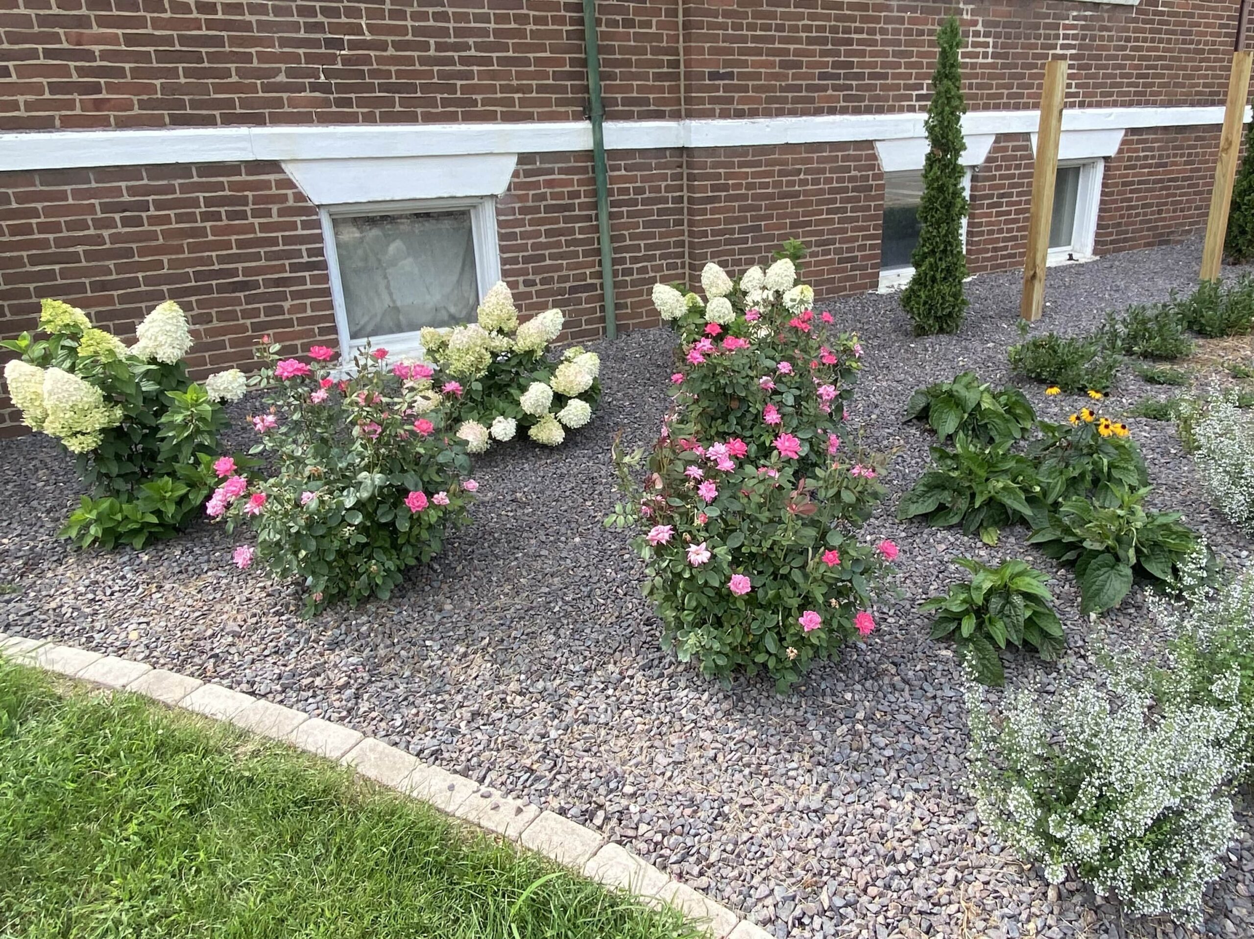 Beautifully arranged rock bed by Krueger Lawn and Landscaping.