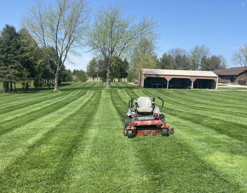 Krueger Lawn and Landscaping's meticulous mowing ensures a lush, green lawn.