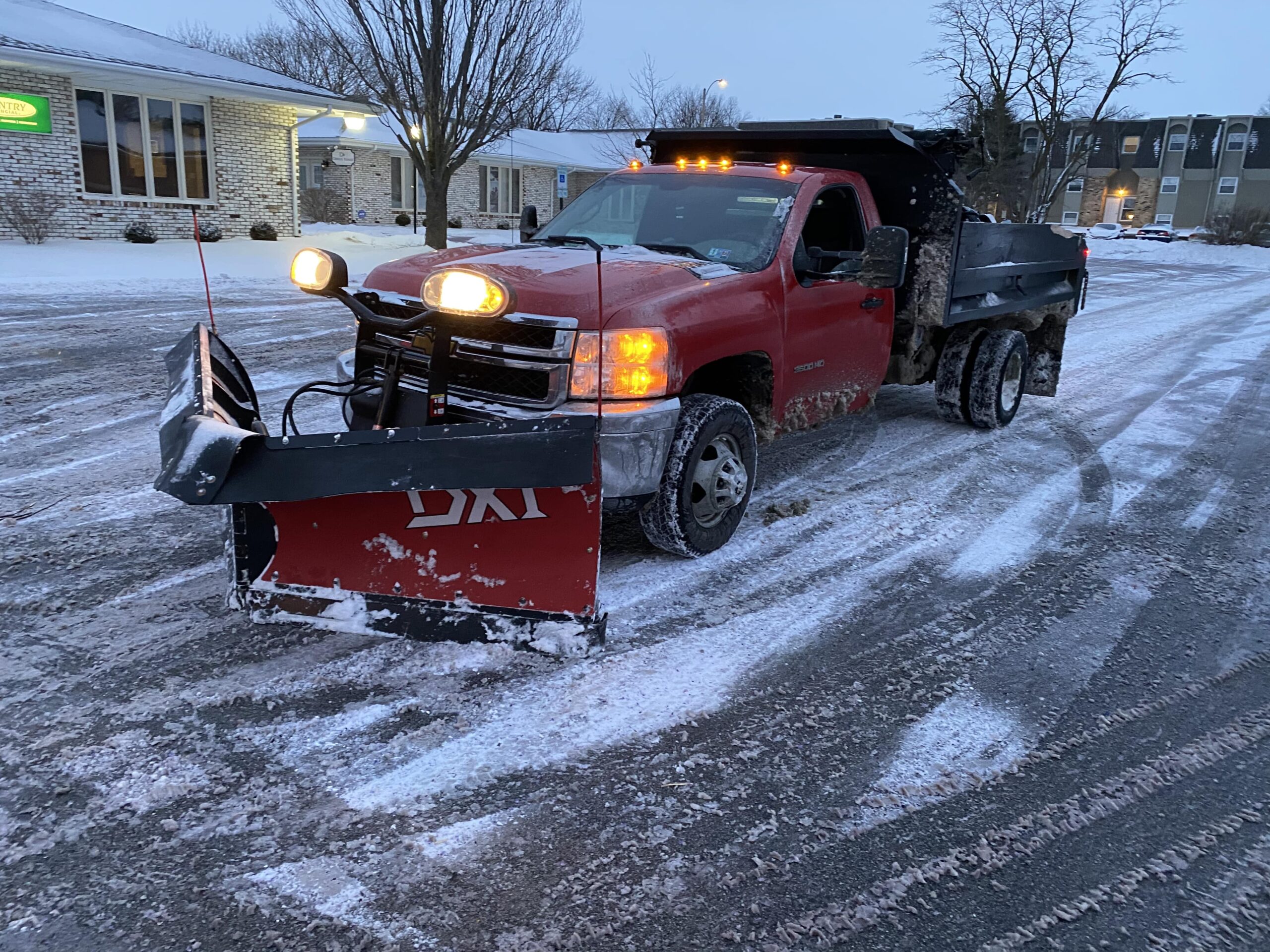 Snow and ice removal services by Krueger Lawn and Landscaping.