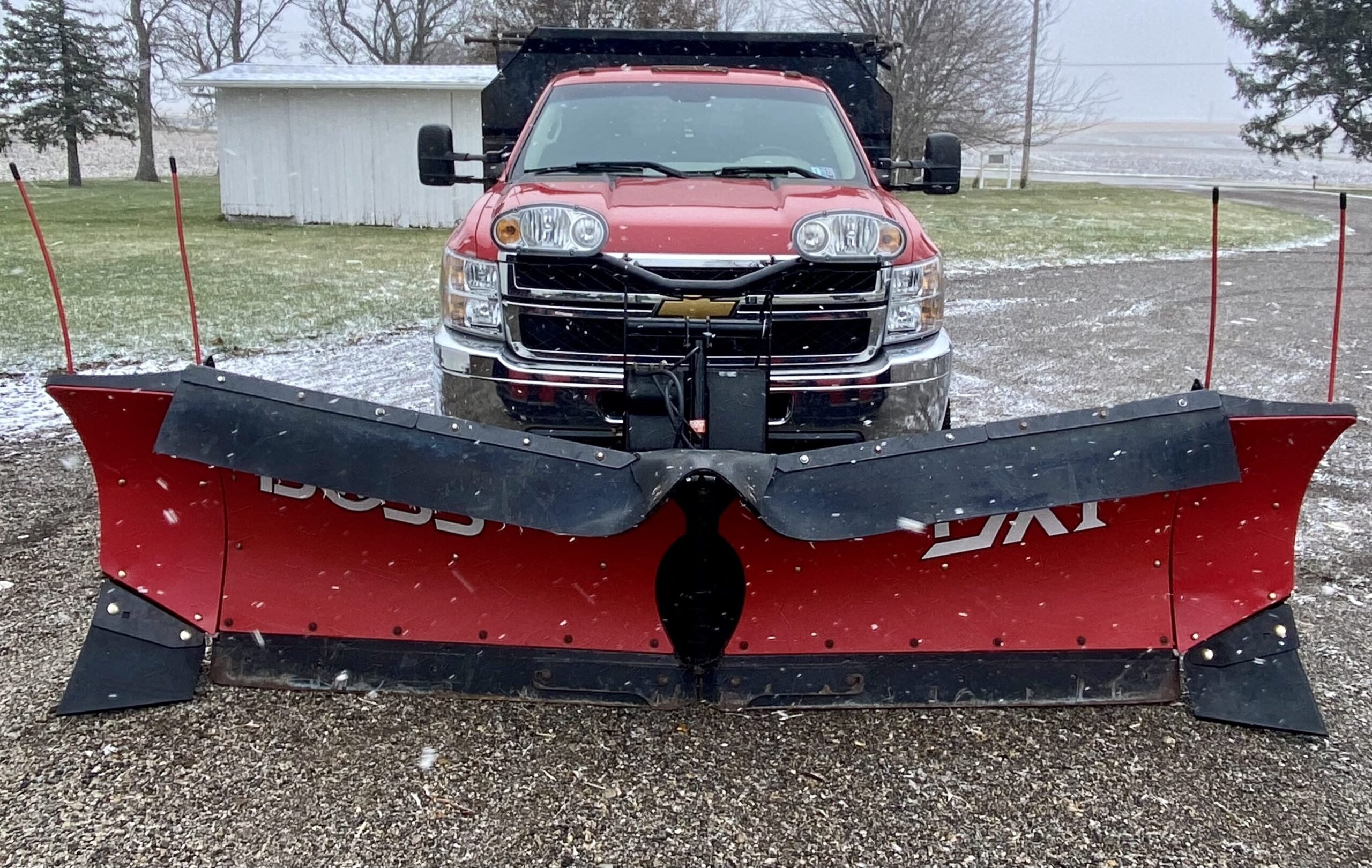 Commercial snow and ice removal in Bloomington, Illinois by Krueger Lawn and Landscaping.